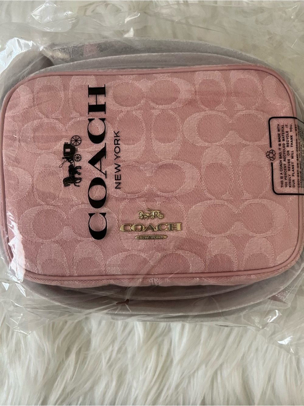 Coach mini Carey in pink denim